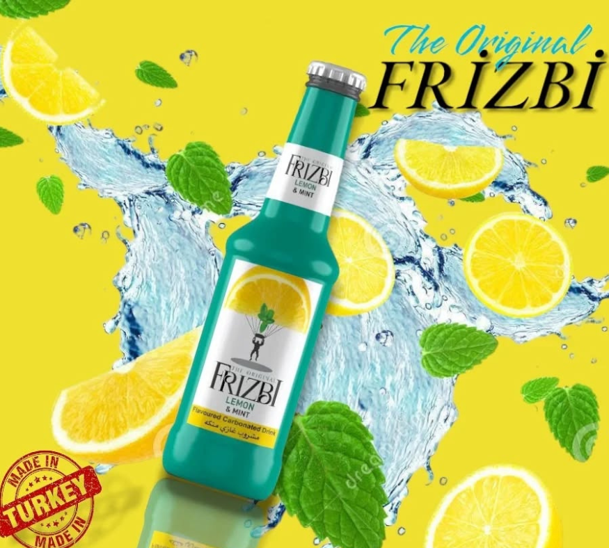 Frizbi lemon and mint flavored soft drink bottle surrounded by lemon slices and mint leaves on a bright yellow background.